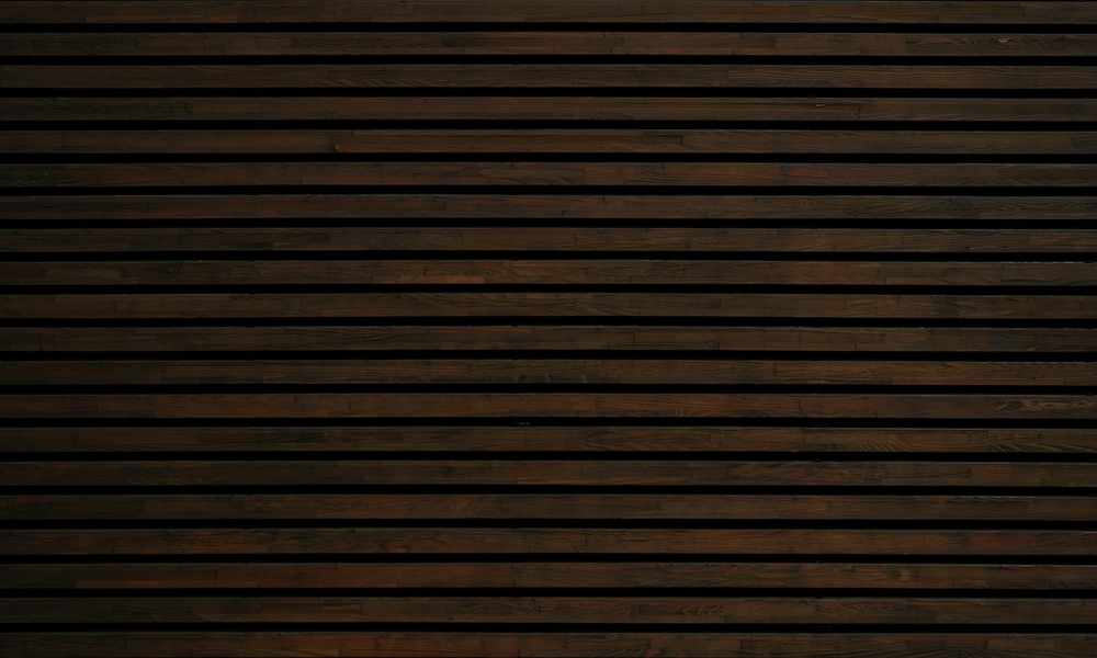 Close-up of horizontal lap siding profile and shadow lines