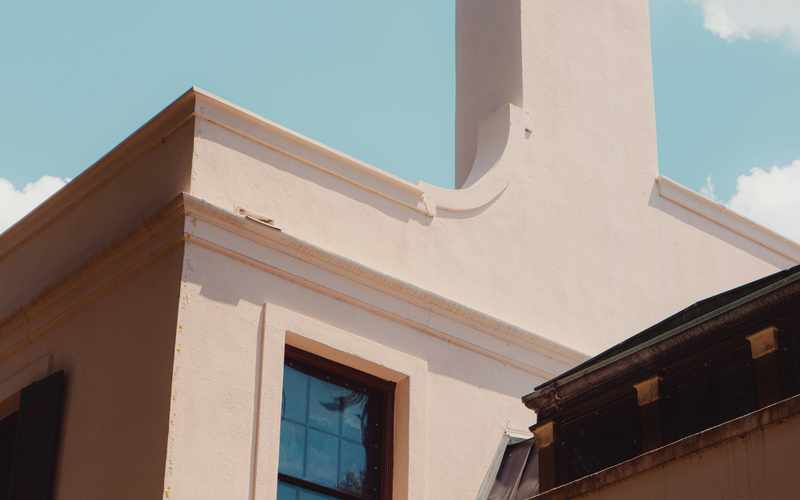 Close-up texture of a stucco exterior wall finish